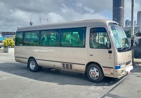 Toyota Coaster bus exterior front and side view in Sri Lanka