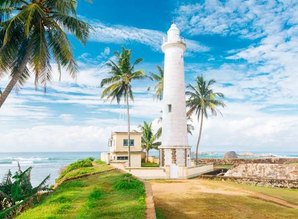 Galle Lighthouse with colonial architecture and coastal view