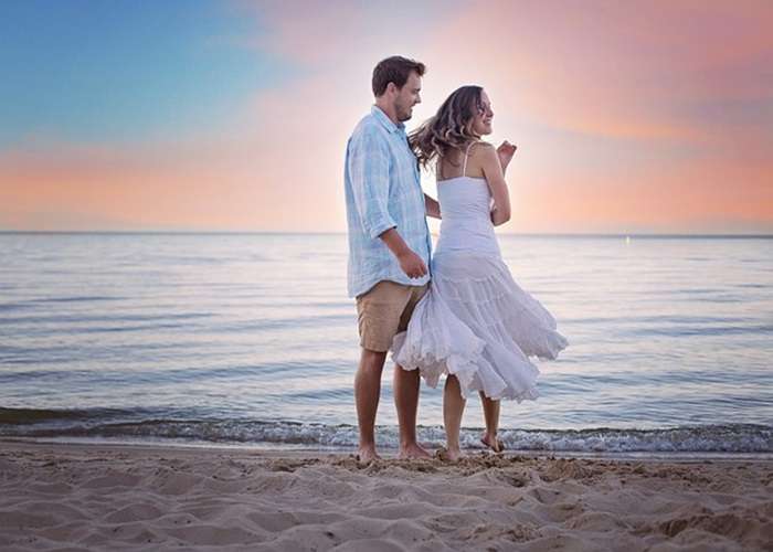 Couple enjoying a romantic escape on a serene beach in Sri Lanka