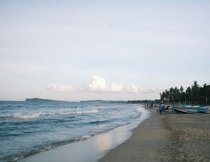 Peaceful early morning view of the beach in Trincomalee before a whale watching trip
