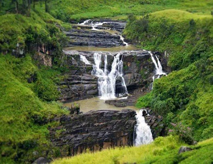 View of St. Clair’s Falls from a train in Sri Lanka’s central highlands