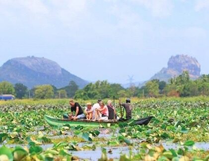Traditional Sigiriya village tour with boat ride on lake