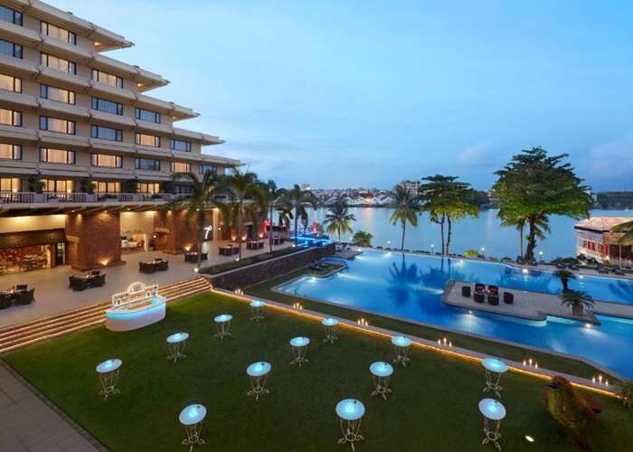 Evening poolside and lake view at Cinnamon Lakeside Hotel Sri Lanka