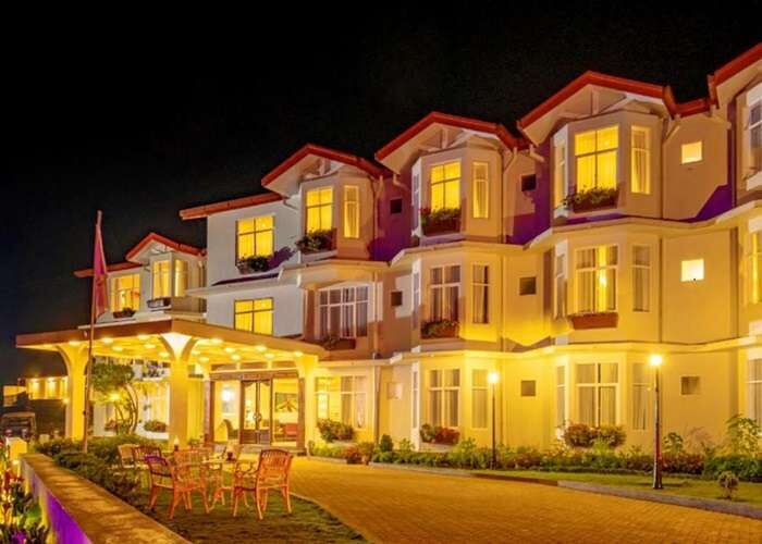 Nighttime view of Galway Heights Hotel with lights on in Sri Lanka
