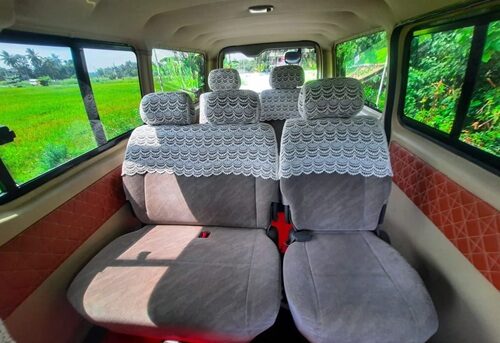 Entire interior of KDH flat roof van showing seating layout.