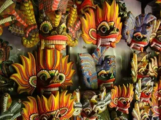 Colorful traditional wooden masks being crafted in Ambalangoda Sri Lanka