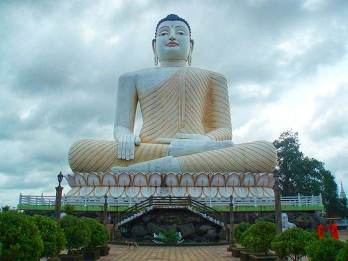 Large seated Buddha statue at Kande Viharaya Temple near Bentota Sri Lanka