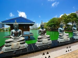 Gangaramaya Temple with Buddha statues in Colombo Sri Lanka during 4 day sri lanka tour