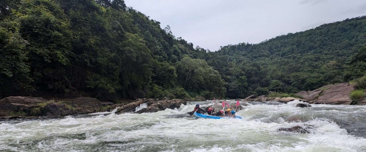 Rafters facing water rapids during white water rafting in Kitulgala Sri Lanka